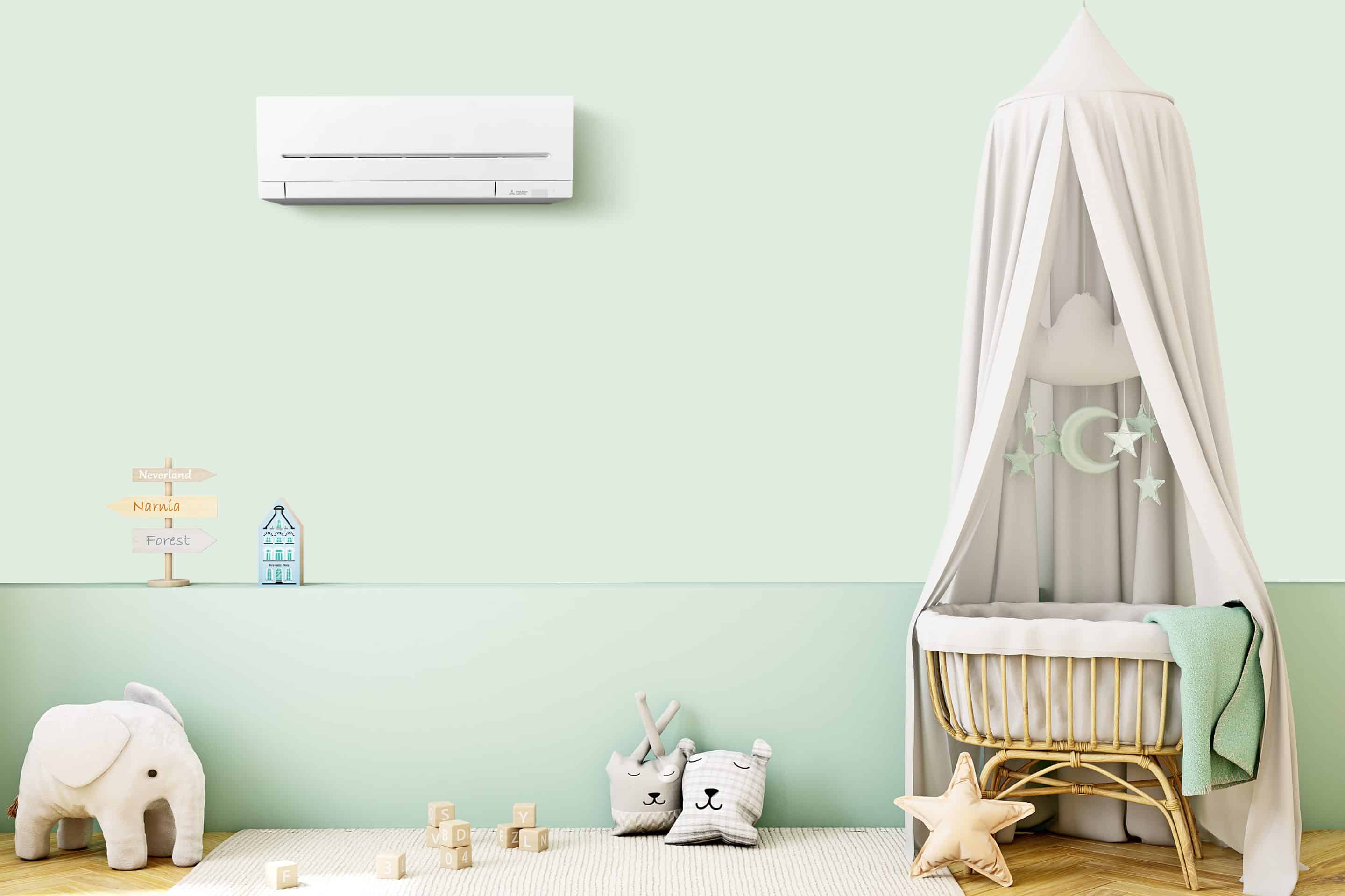 a mitsubshi electric heat pump displayed on the wall of a nursery