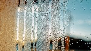 a window streams with condensation